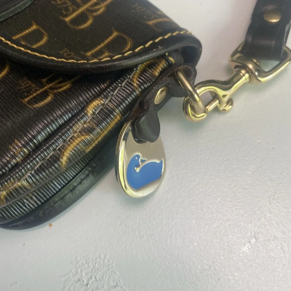 Dooney & Bourke Vintage 1975 Signature Logo Navy Gold Logo Snap Flap Wristlet
